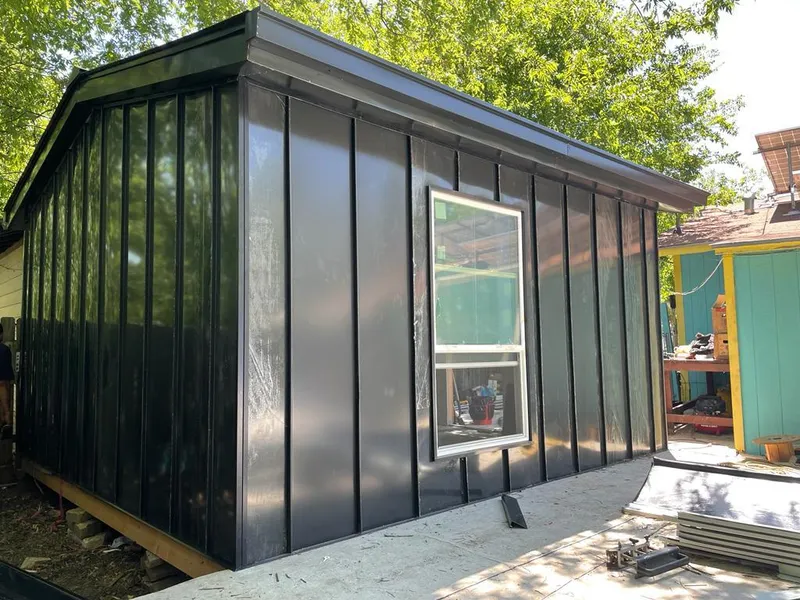 Black standing seam metal wall panels for Roof Inspection in Buenaventura Lakes