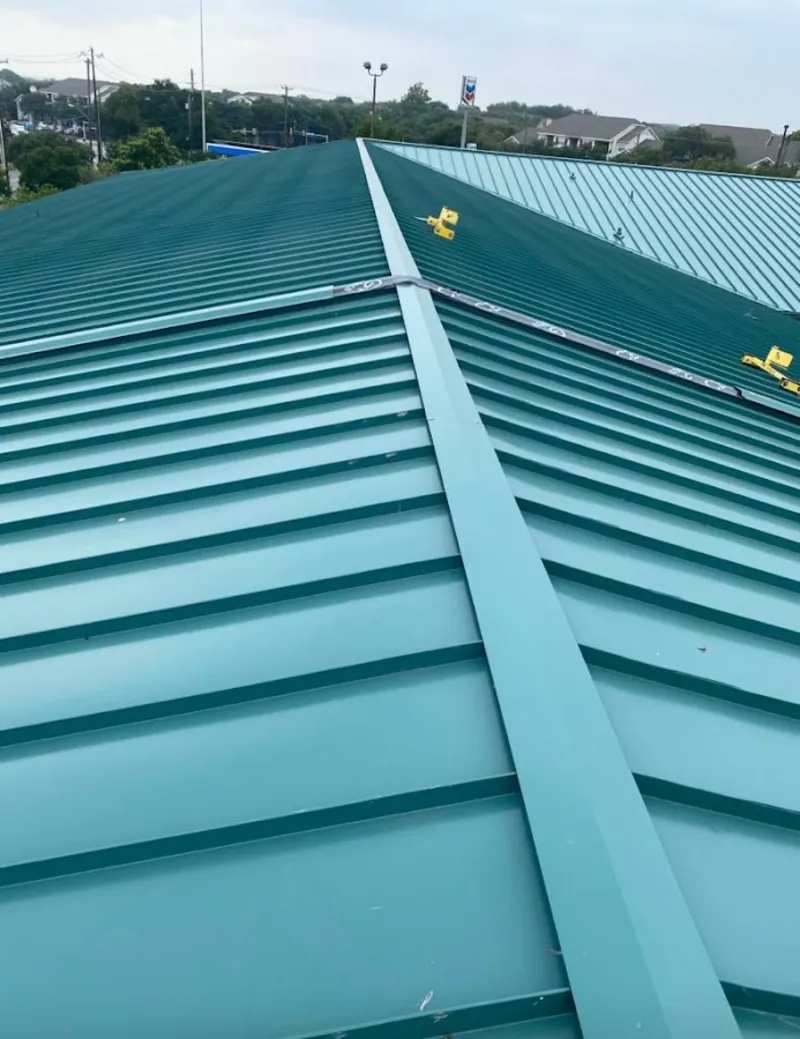 Green commercial metal roof ridge and valley for Metal Roof Repair in Buenaventura Lakes
